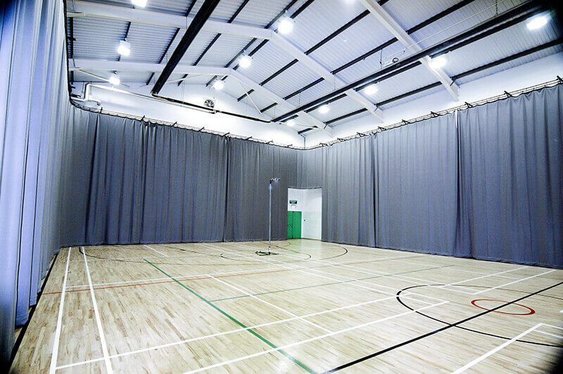 Perimeter track and curtains sports Hall Manchester Uni