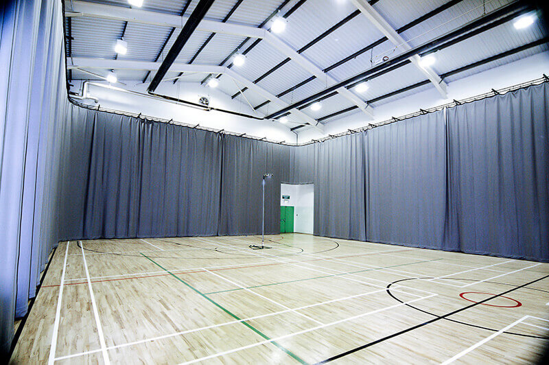 Perimeter track and curtains sports Hall Manchester Uni